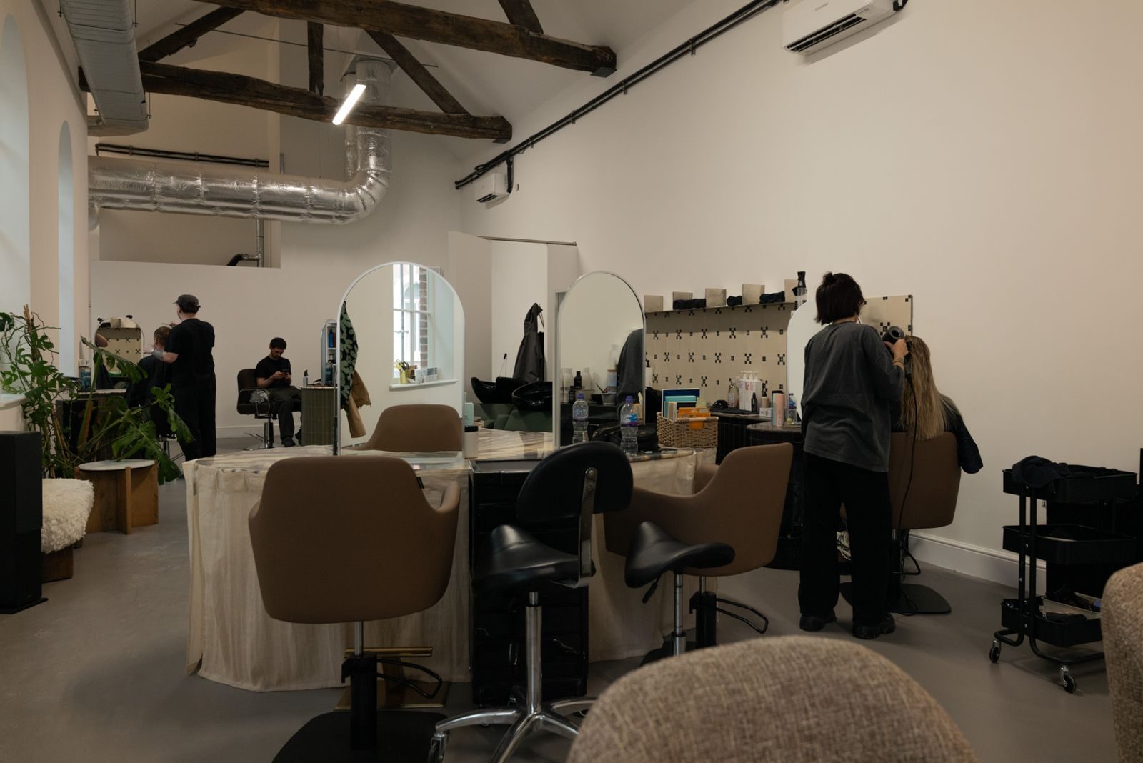 First White Cloth Hall — hair salon under the original timber trusses