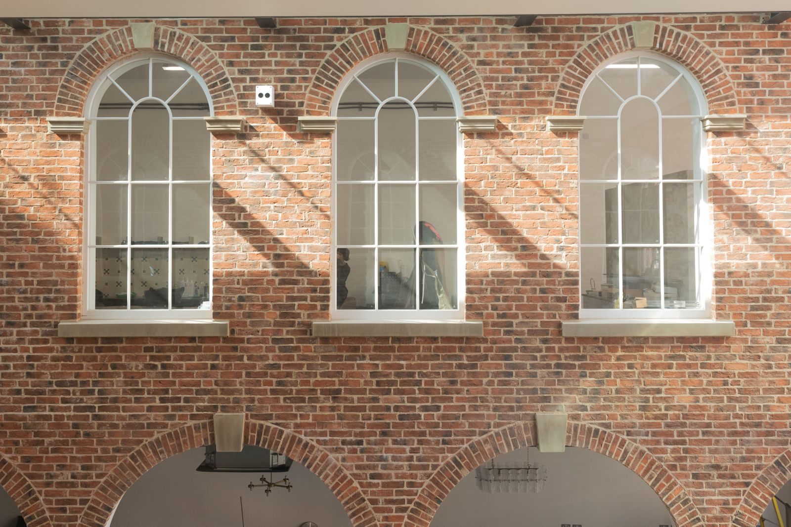 First White Cloth Hall — arched brick windows