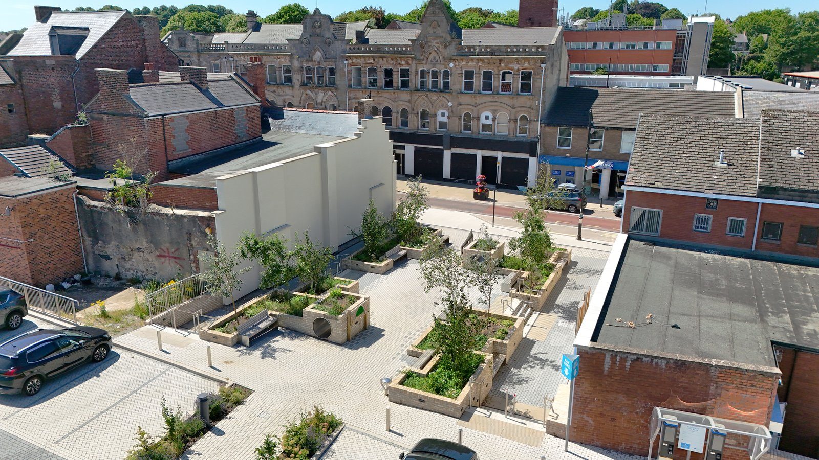 Kingsway Square — the completed square and its planted walking route, from the air