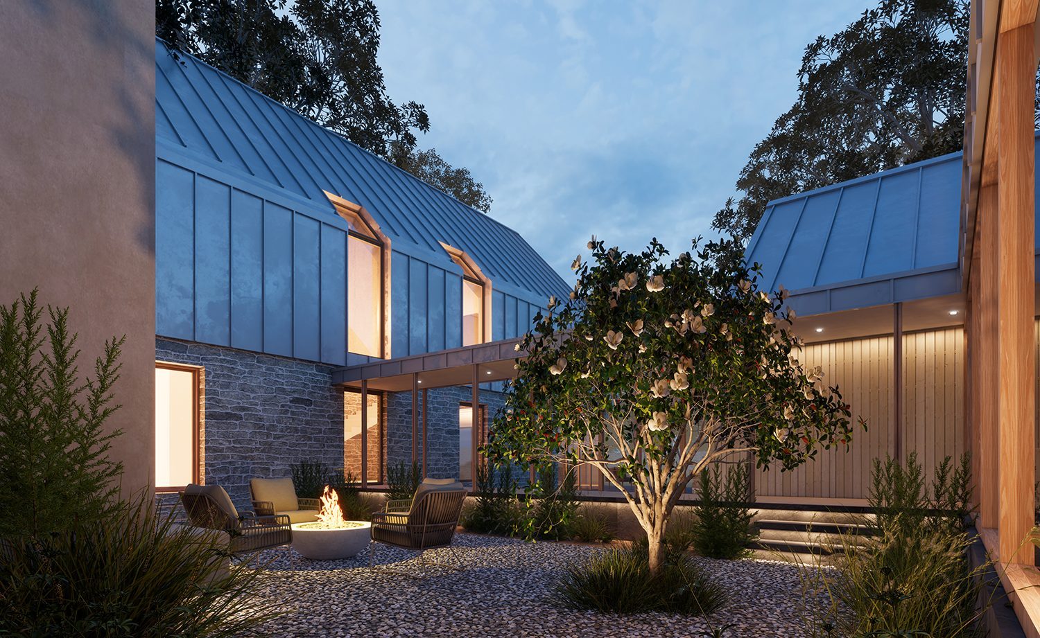 The Lake House — courtyard at dusk with fire pit