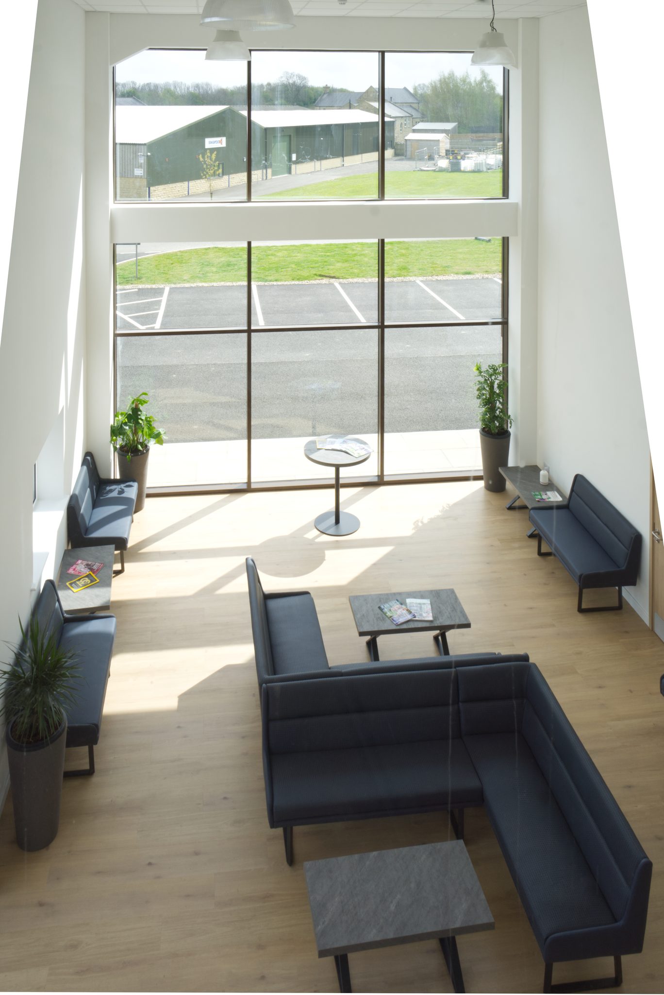 Double-height waiting area and atrium glazing